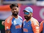 India's Hardik Pandya, left, with captain Rohit Sharma during T20 World Cup