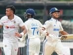 Yashasvi Jaiswal and Shubman Gill run between the wickets during the first test cricket match of a series between India and Bangladesh