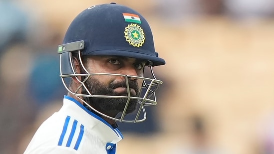 Virat Kohli reacts as he leaves the field after losing his wicket on the second day of the first cricket test match between India and Bangladesh, in Chennai.