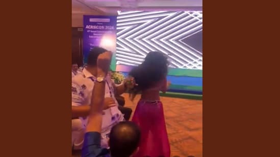 A dance performance during a medical conference has raised eyebrows online