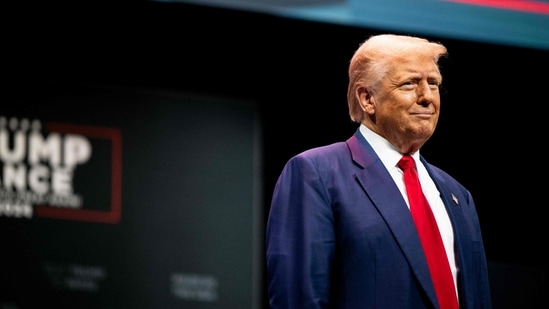 Republican presidential nominee, former U.S. President Donald Trump arrives during a campaign rally at the Johnny Mercer Theatre on September 24, 2024 in Savannah, Georgia. (Photo by Brandon Bell / GETTY IMAGES NORTH AMERICA / Getty Images via AFP)(Getty Images via AFP)